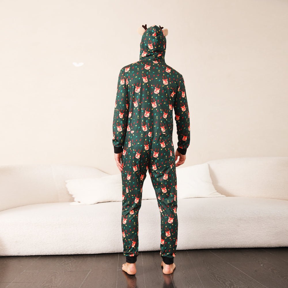 Rear view of a man's green Christmas print onesie with the antlered hood up and black wrist and ankle cuffs.
