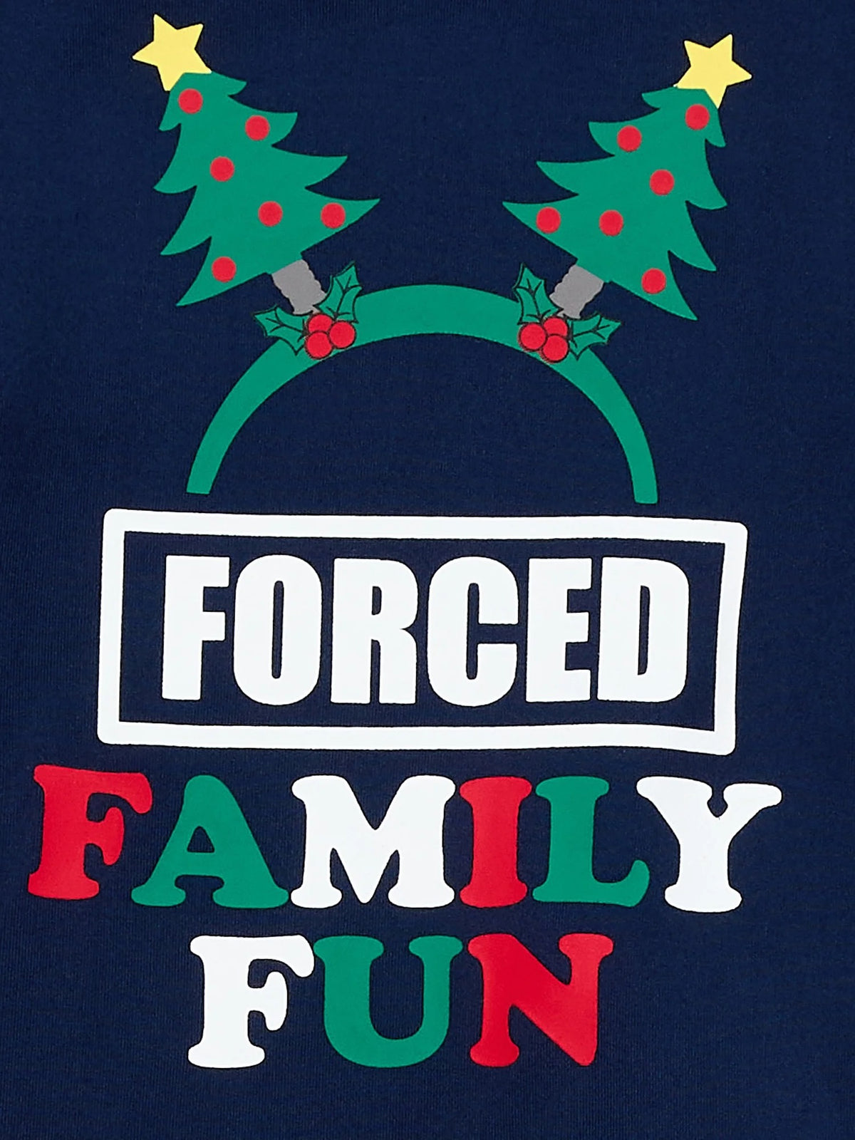 Close-up of the Forced Family Fun lettering and Christmas tree headband graphic on a navy pajama top.