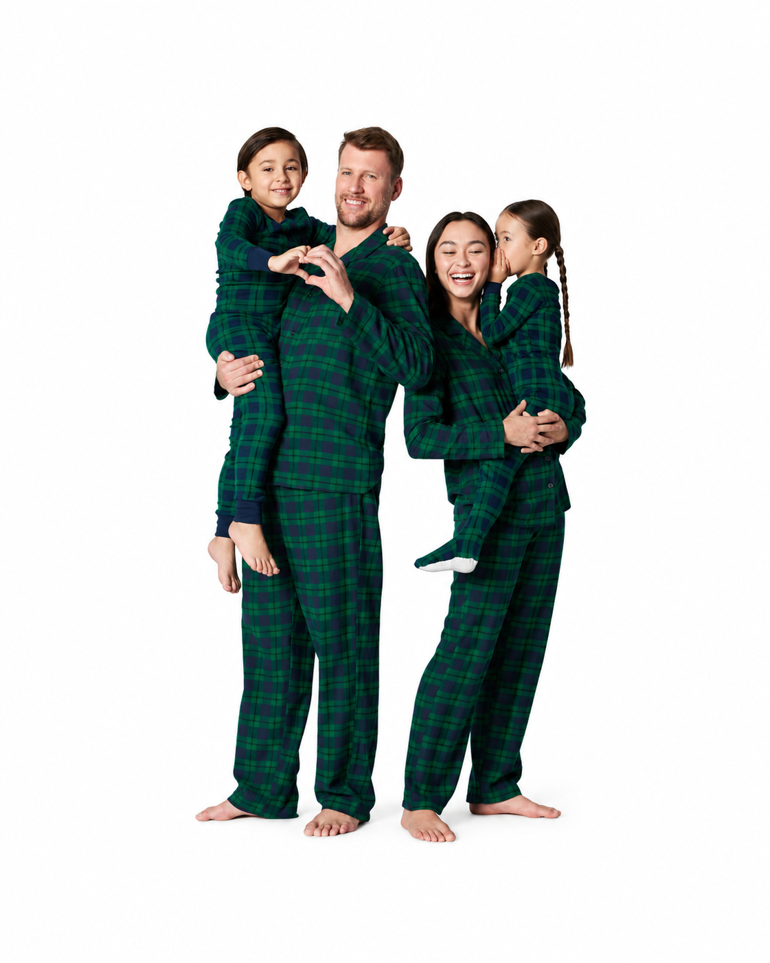 Parents holding their children while wearing matching forest green and navy plaid pajama sets on white.