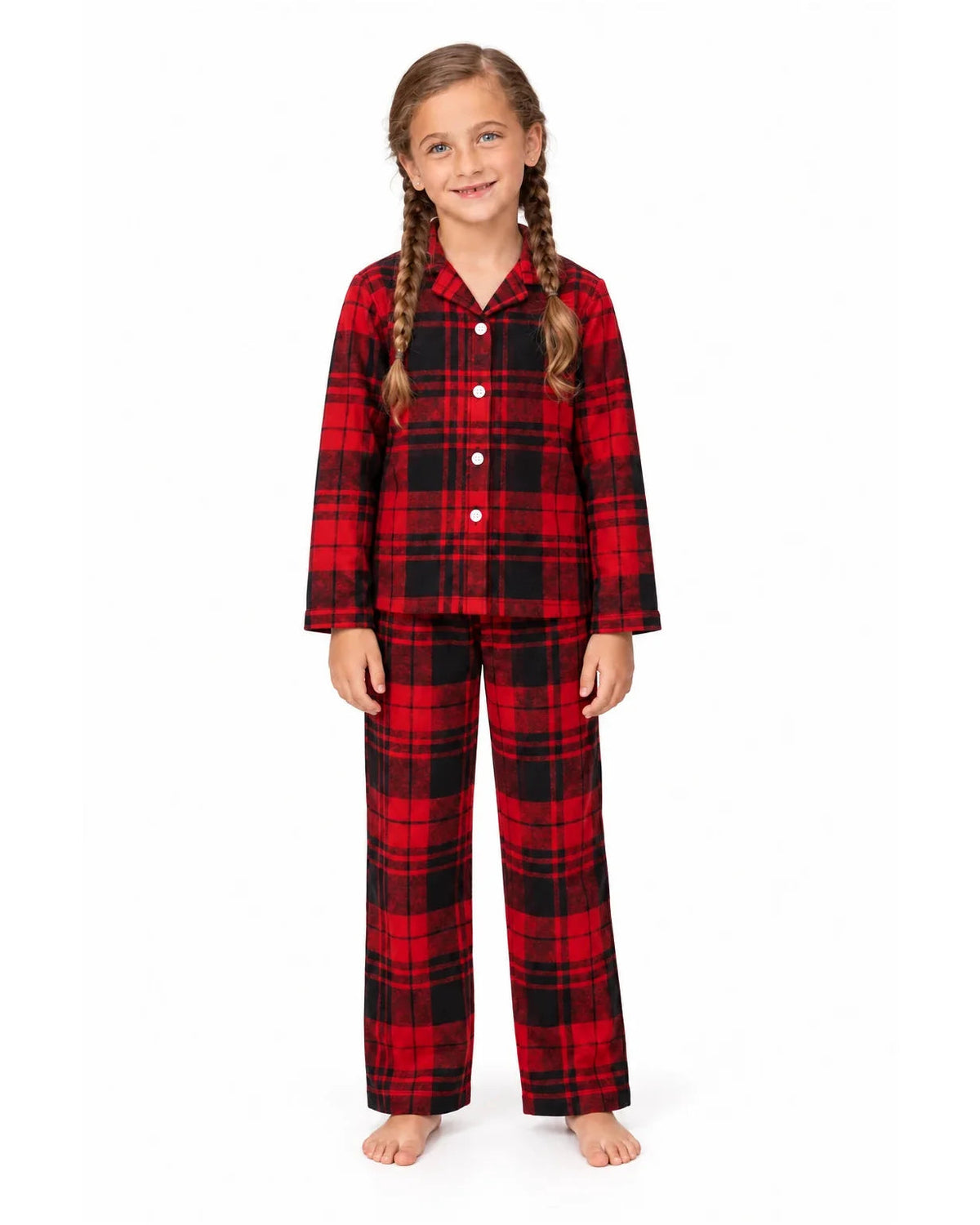 Girl wearing a red and black tartan collared pajama shirt and matching long pants.