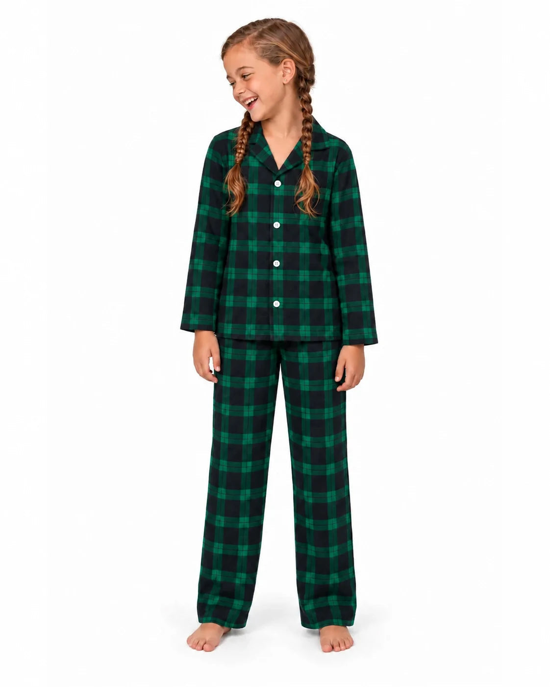 Girl wearing a green and black plaid collared pajama shirt and long pants, front view.