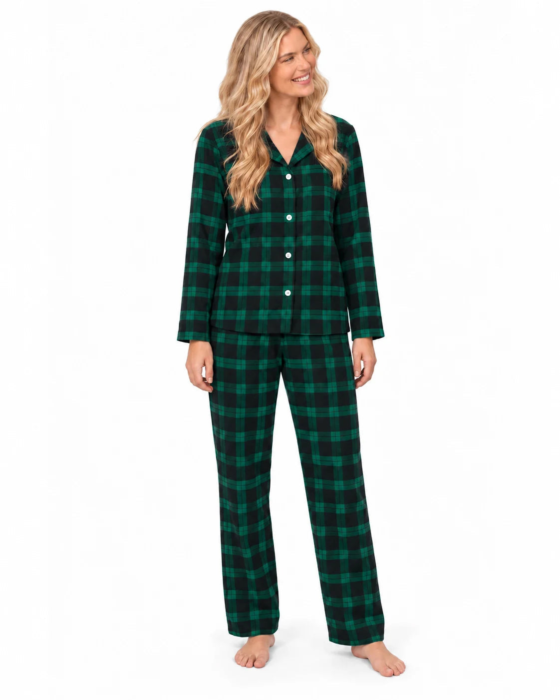 Woman modeling a green and black plaid long-sleeve pajama shirt and matching pants, front view.