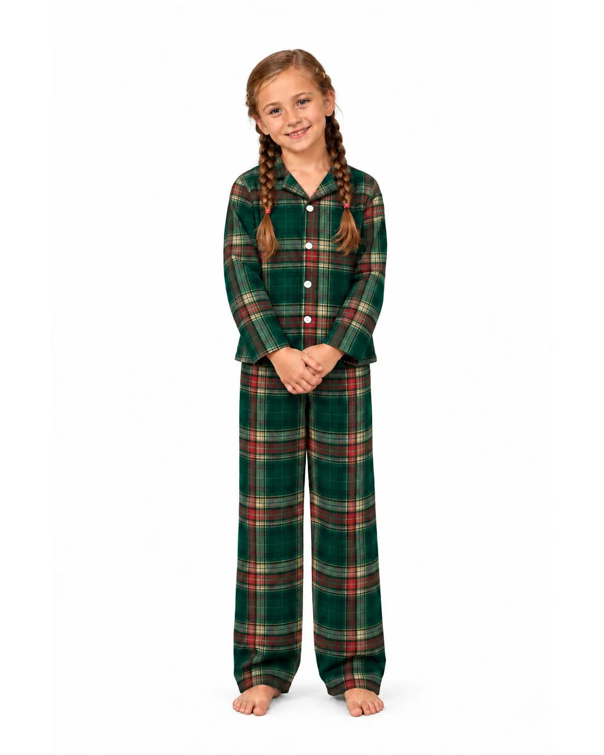 Girl wearing a light green tartan button-front pajama shirt and long pants, front view.