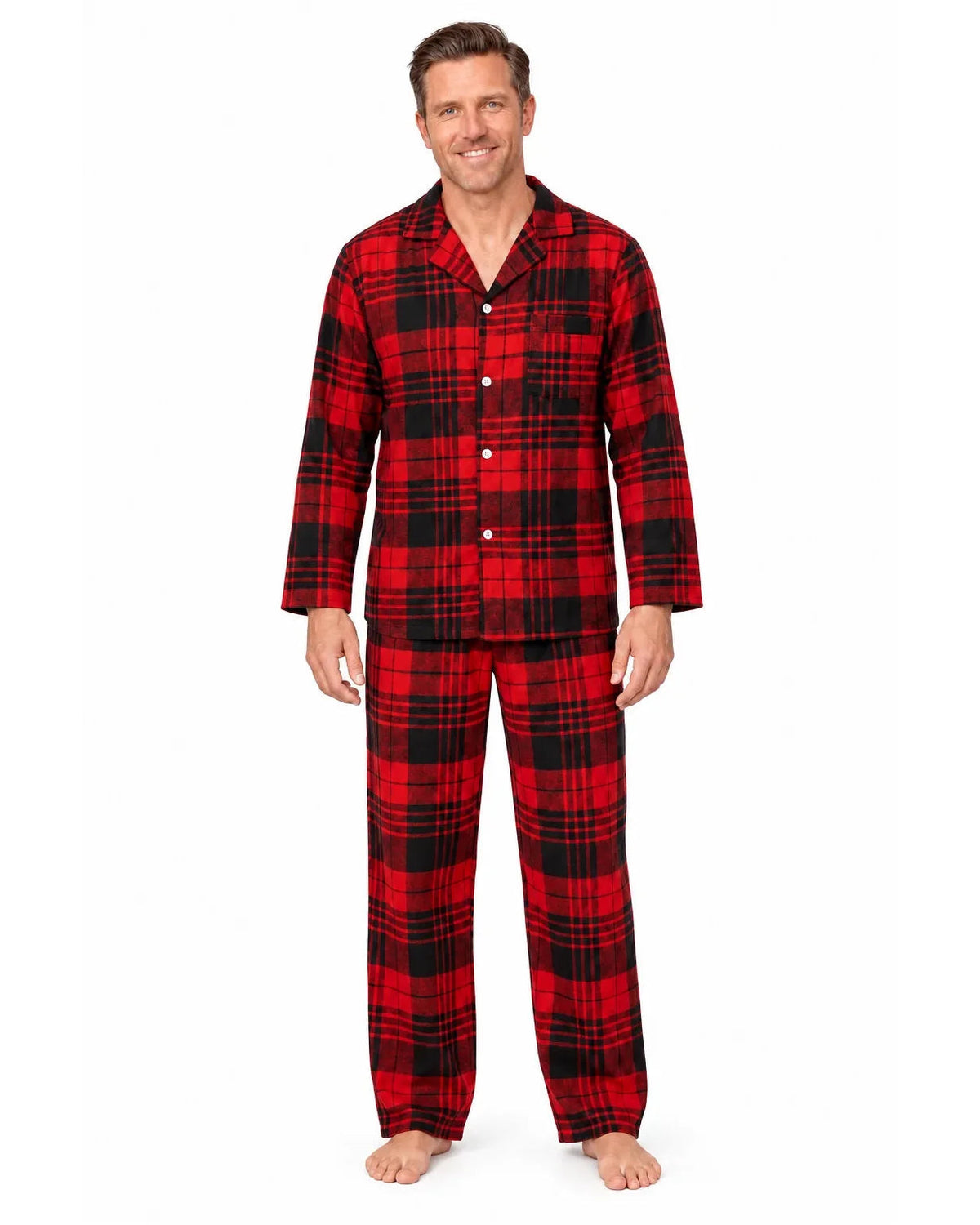 Front view of a man wearing a red and black tartan collared pajama shirt and matching long pants.