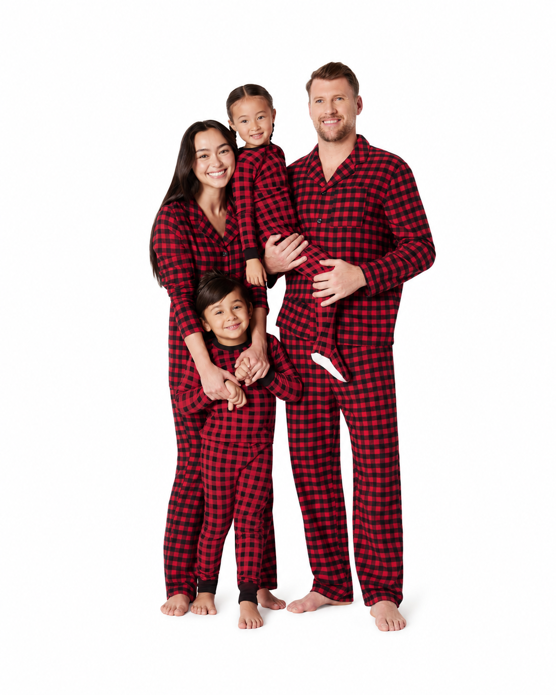 Parents and two children wearing matching red and black check pajama sets against a white background.