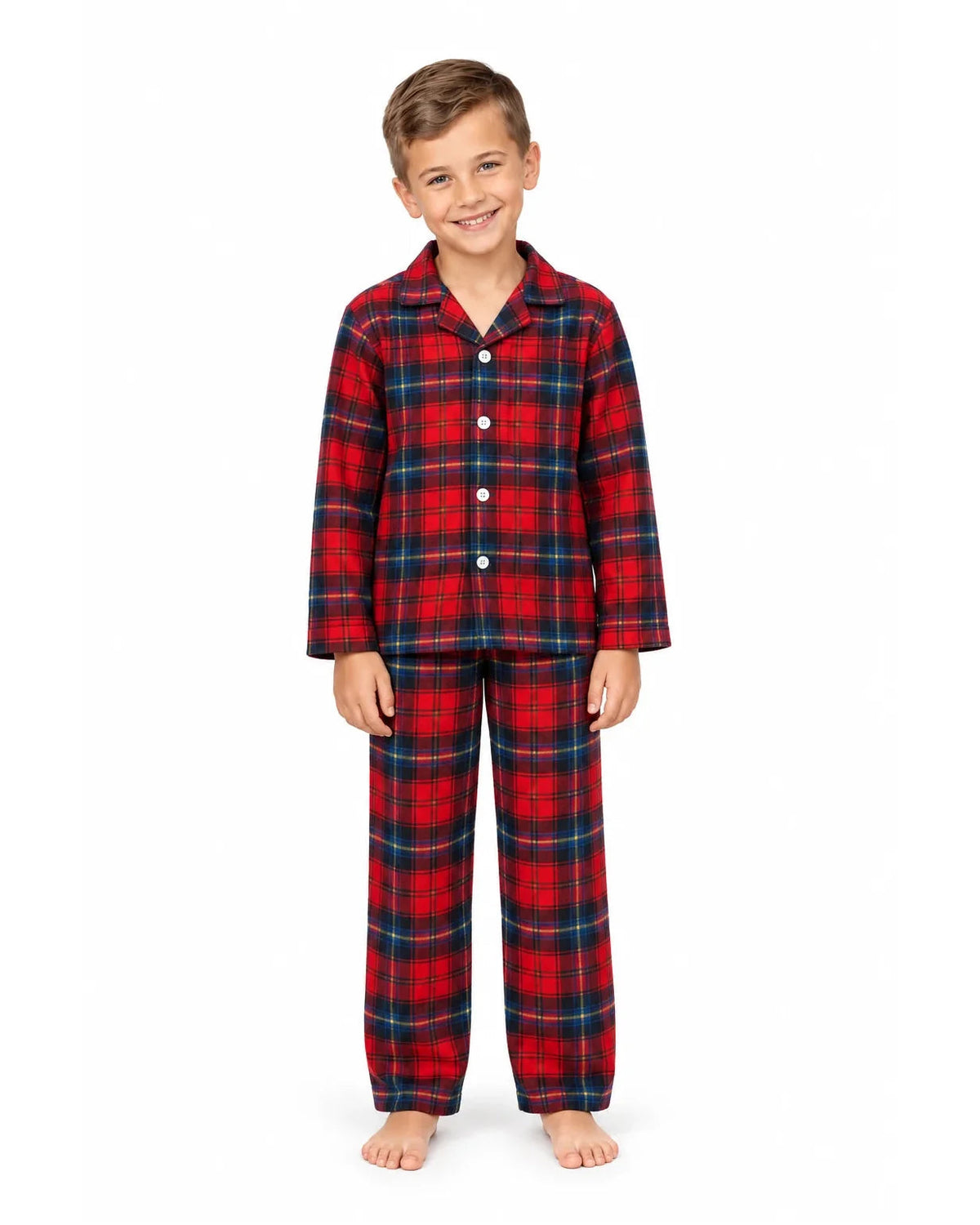 Boy wearing a red and blue plaid collared pajama shirt and long pants, front view.