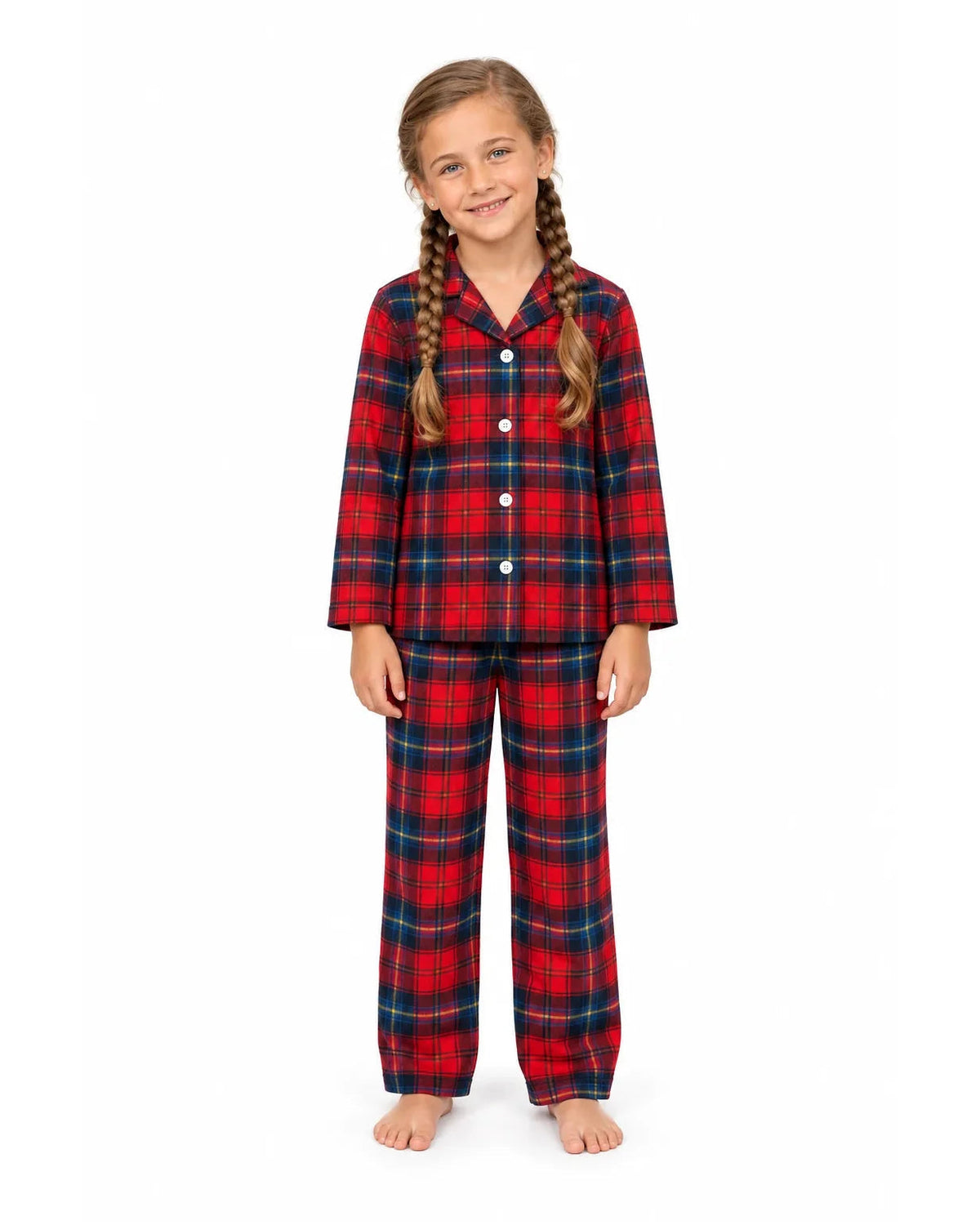 Girl wearing a red and blue plaid button-front pajama shirt and long pants, front view.