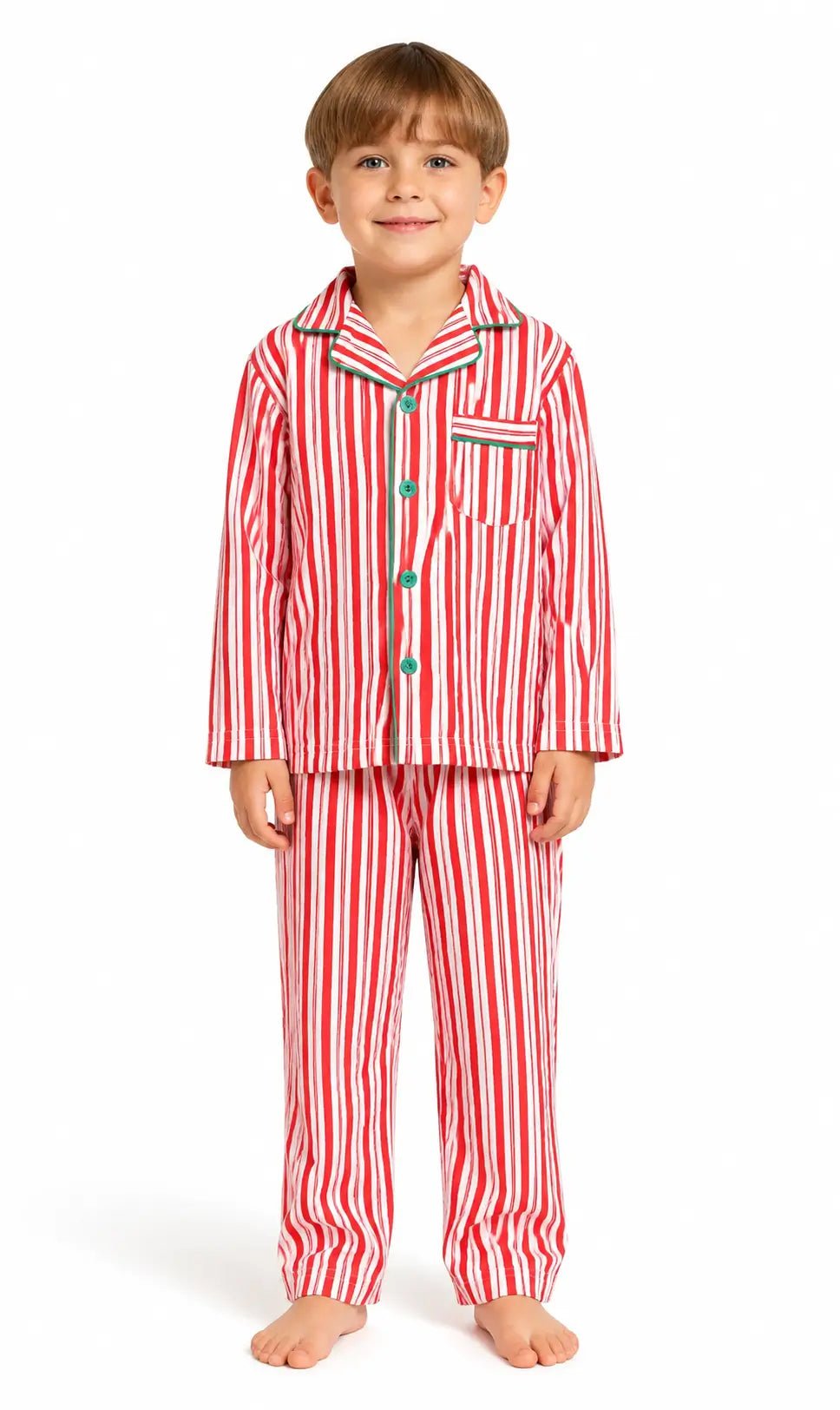 Boy modeling red-and-white vertically striped button-front pajamas with green piping against a white background.