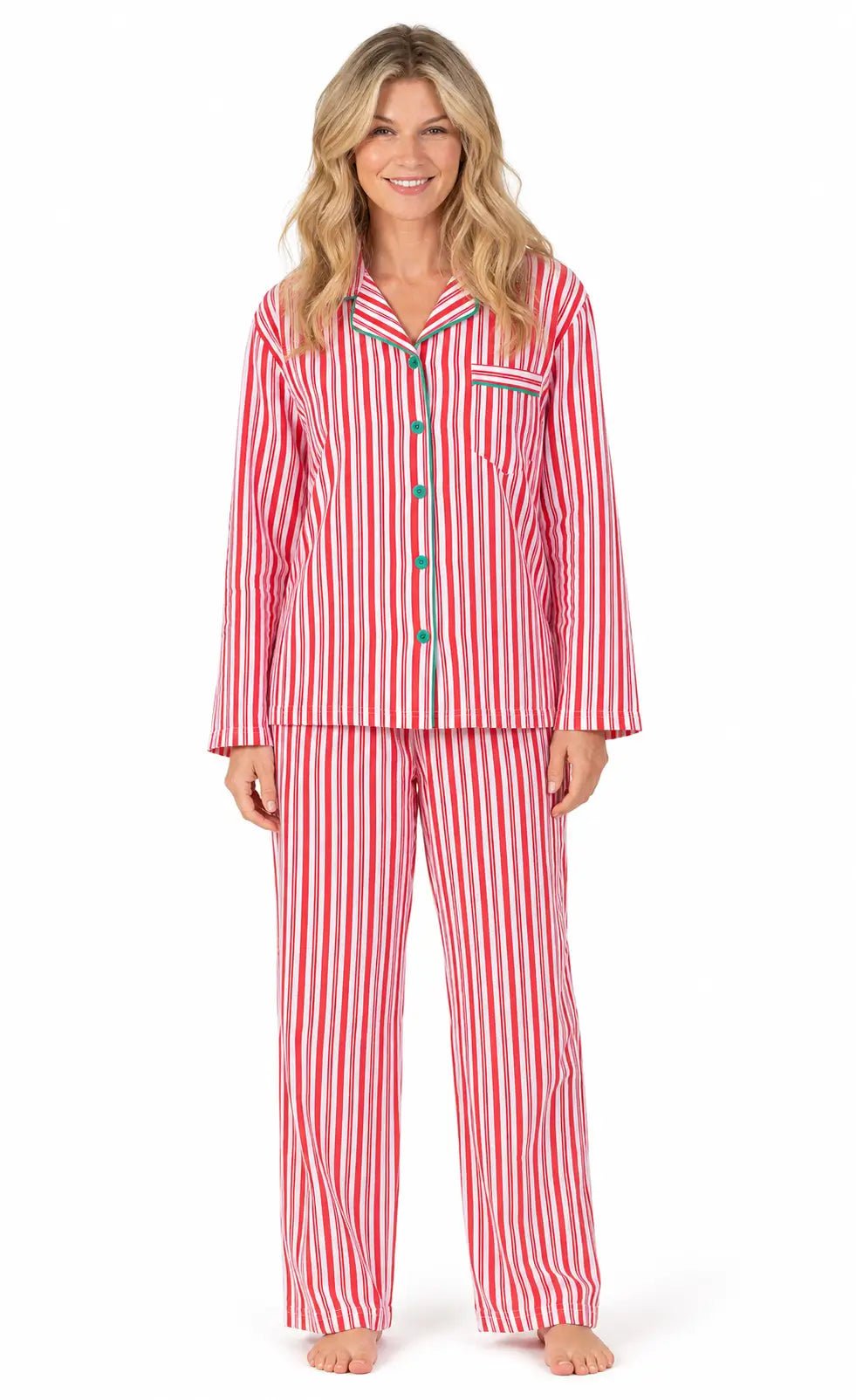 Woman modeling red-and-white vertically striped button-front pajamas with green piping against a white background.
