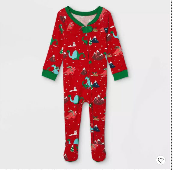 Red baby Christmas sleeper with colorful dinosaurs, snow and trees, green trim, a front zipper and enclosed feet.